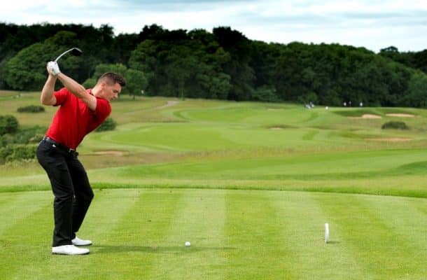 Man playing golf