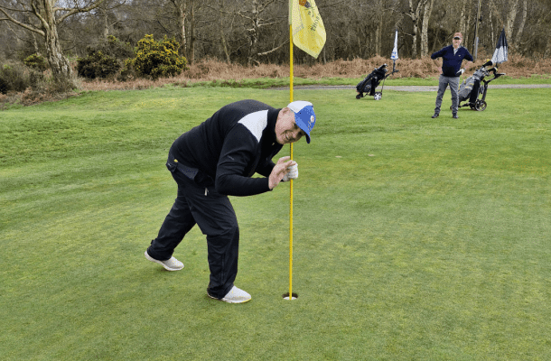 Golfer making a hole-in-one